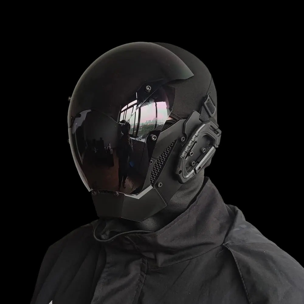 Person wearing a black helmet and coat on a white background